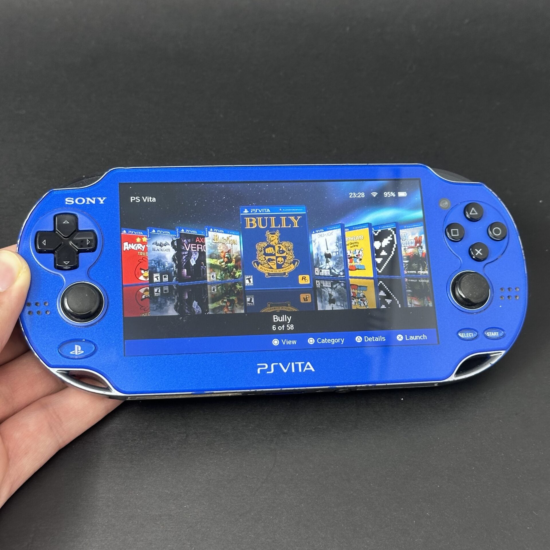 PS Vita OLED (128GB) - 580 Games | Sapphire Blue image 0