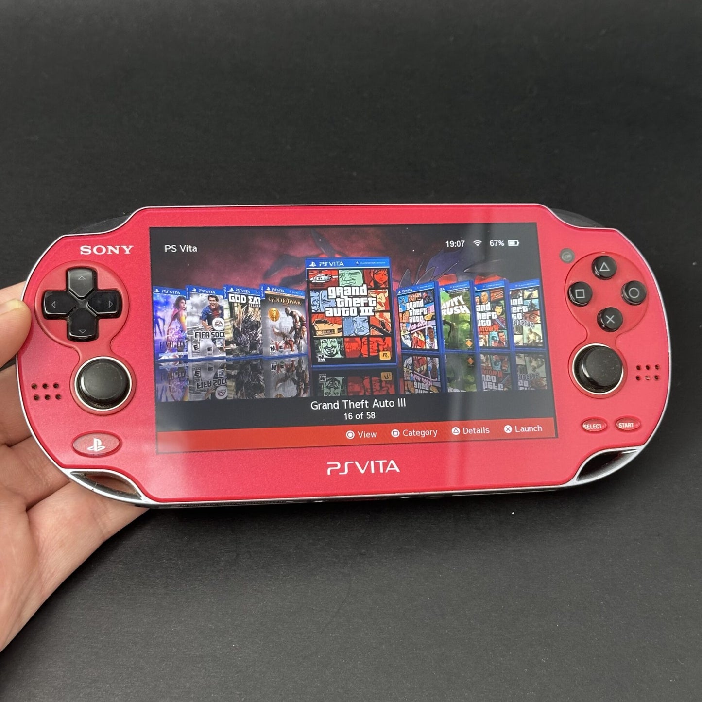 PS Vita OLED (128GB) - 580 Games | Cosmic Red image 0