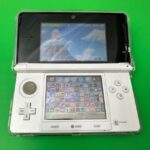 Nintendo 3DS with 600+ Games | Ice White with Hylian Shield Case