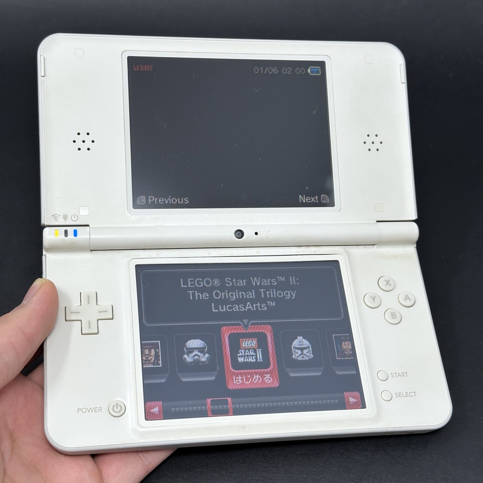 Nintendo DSi selling XL with games