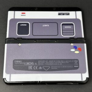 New Nintendo 3DS (64GB) – 600+ Games | w/ SNES Cover Plates