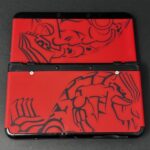 New Nintendo 3DS (64GB) – 600+ Games | w/ Omega Ruby Cover Plates