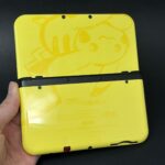 New Nintendo 3DS XL (64GB) – 600+ Games | Black and Yellow Pikachu