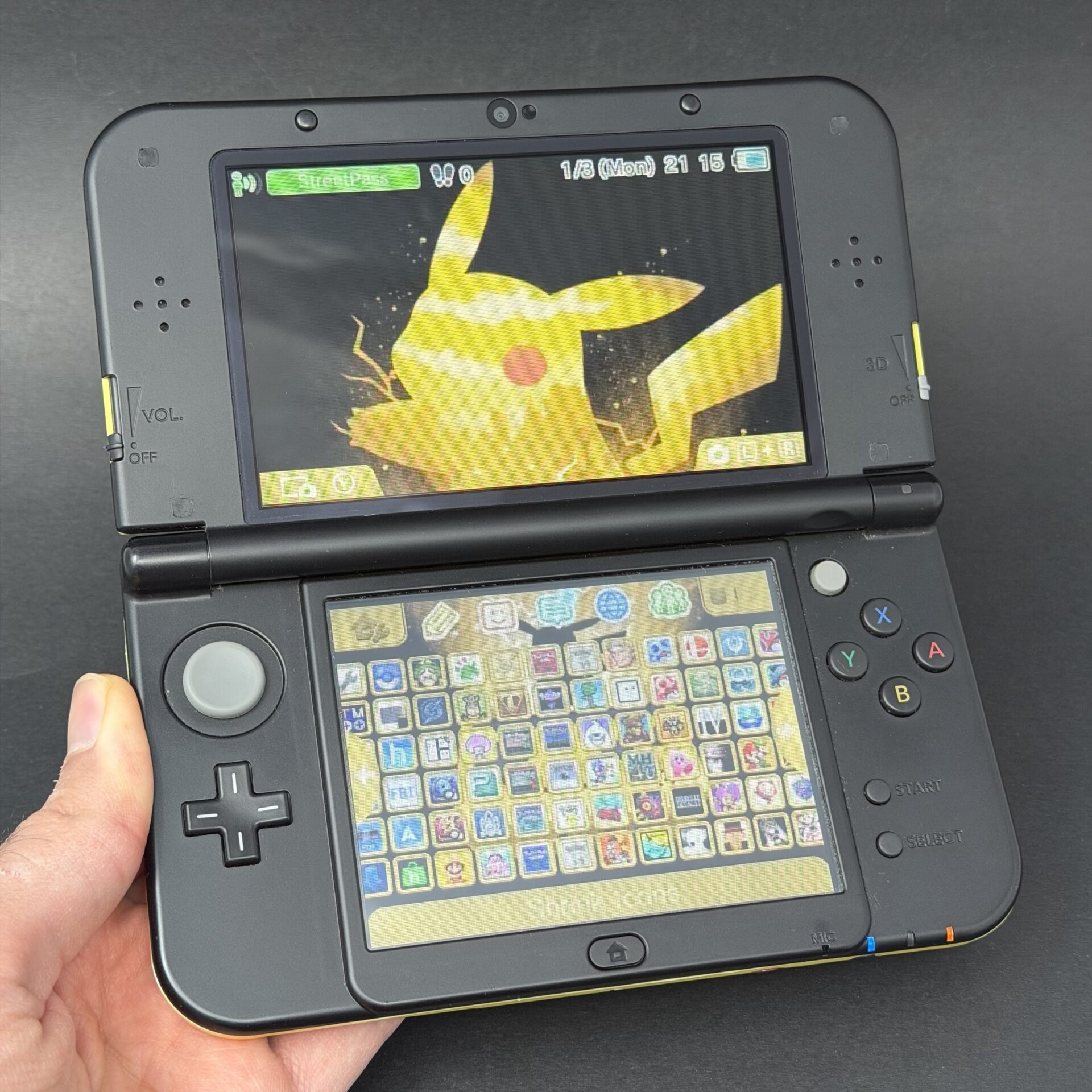 New Nintendo 3DS XL (64GB) – 600+ Games | Black and Yellow Pikachu - Image 2