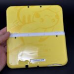New Nintendo 3DS XL (64GB) β 600+ Games | White and Yellow Pikachu (Top IPS)