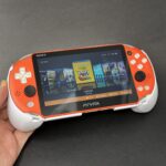 ULTIMATE PS Vita Slim (128GB) - 580 Games | Orange and White