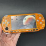 PSP 3000 (128GB) - 1050 Games | Orange and Black