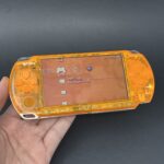 PSP 3000 (128GB) - 1050 Games | Clear Orange