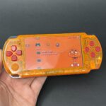 PSP 3000 (128GB) - 1050 Games | Orange and Red