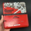 img_0773.jpeg Nintendo 3DS XL (64GB) – 600+ Games | Smash Bros Red