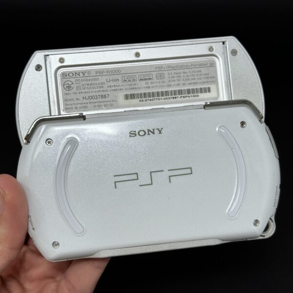 img_0806.jpeg MODDED PSP GO | 1025 Pre-Loaded Games | White and Black | 128GB