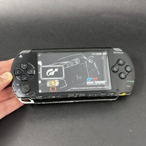img_1001.jpeg PSP 1000 (128GB) – 1050 Games | Piano Black