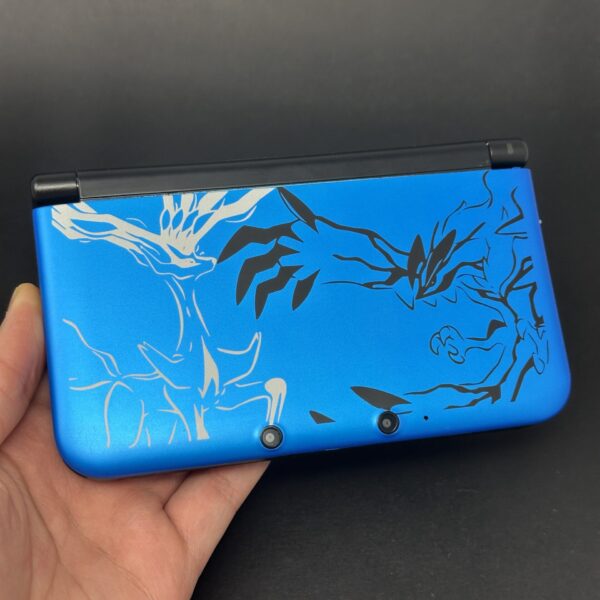 img_1570-1.jpeg Nintendo 3DS XL (64GB) – 600+ Games | Pokémon XY Limited Edition Blue