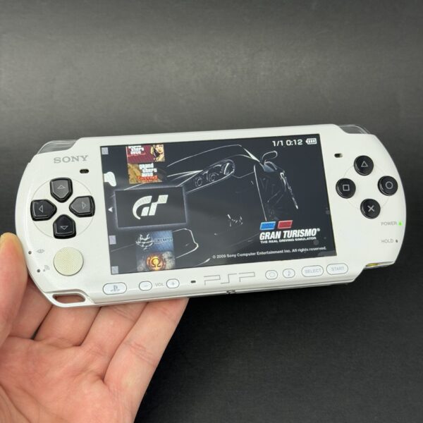 img_1620.jpeg PSP 3000 (128GB) - 1050 Games | White and Black w/ IPS Screen!