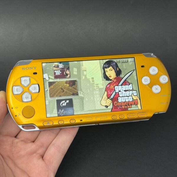 img_1622.jpeg PSP 3000 (128GB) - 1050 Games | Yellow and White w/ IPS Screen!