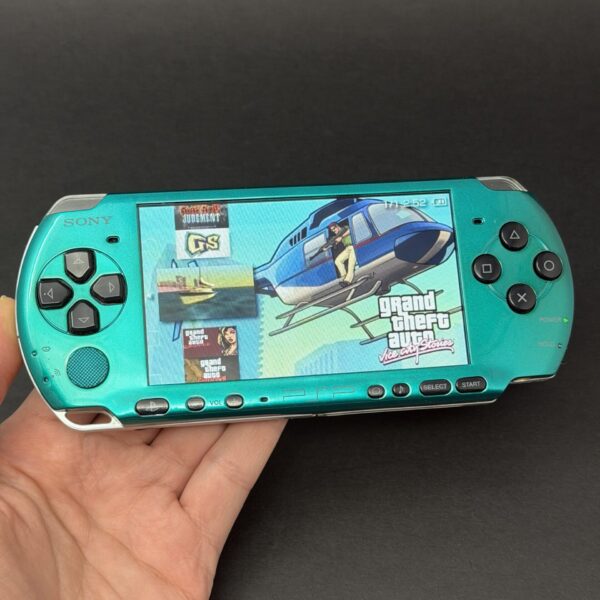 img_1763.jpeg PSP 3000 (128GB) - 1050 Games | Cyan and Black w/ IPS Screen!