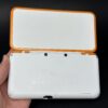 img_1801.jpeg New Nintendo 2DS Xl with 600+ Games | White and Orange