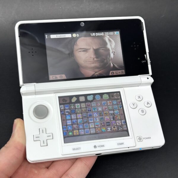img_2077.jpeg Nintendo 3DS (64GB) – 600+ Games | Pure White (Rare)