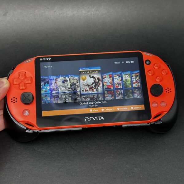 img_2431.jpeg ULTIMATE PS Vita Slim (128GB) - 580 Games | Neon Orange