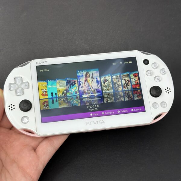 img_3334.jpeg PS Vita Slim (128GB) - 580 Games | White and Pink