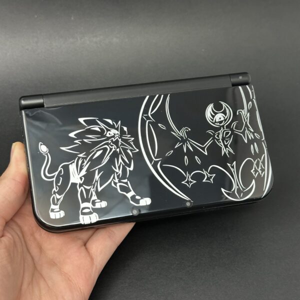 img_4297.jpeg New Nintendo 3DS XL (64GB) – 600+ Games | Solgaleo Lunala Edition